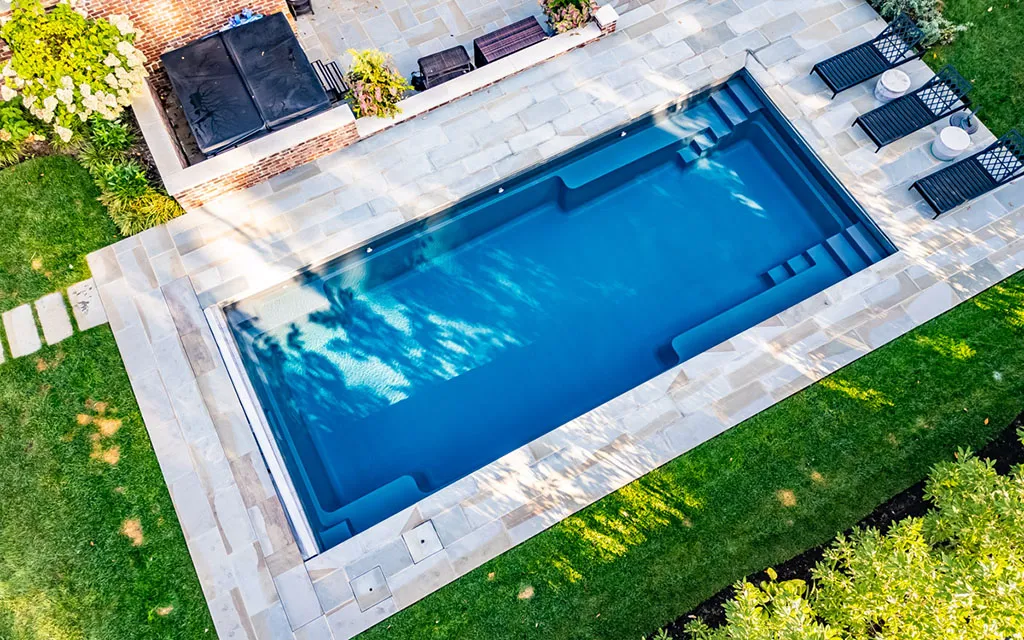 Drone view of a Leisure Pools inground fiberglass pool Leisure Pools Lake City: Northern Indiana's trusted fiberglass pool experts
