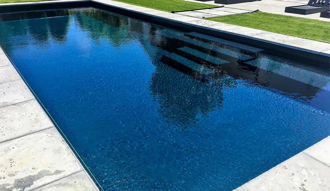 The Grand rectangular fiberglass pool with great side entry steps from Leisure Pools Lake City